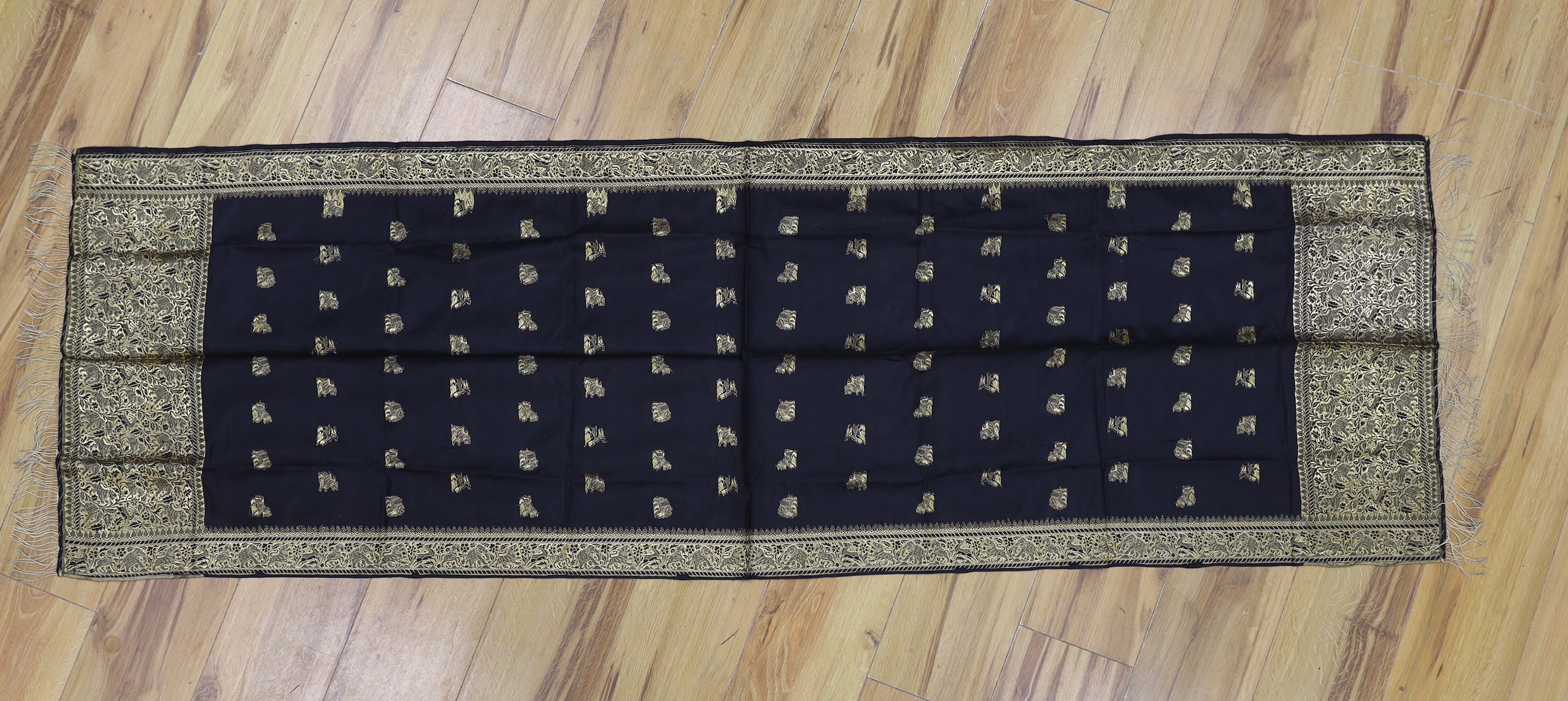 A gold thread Indian embroidered stole, 184 x 57cm